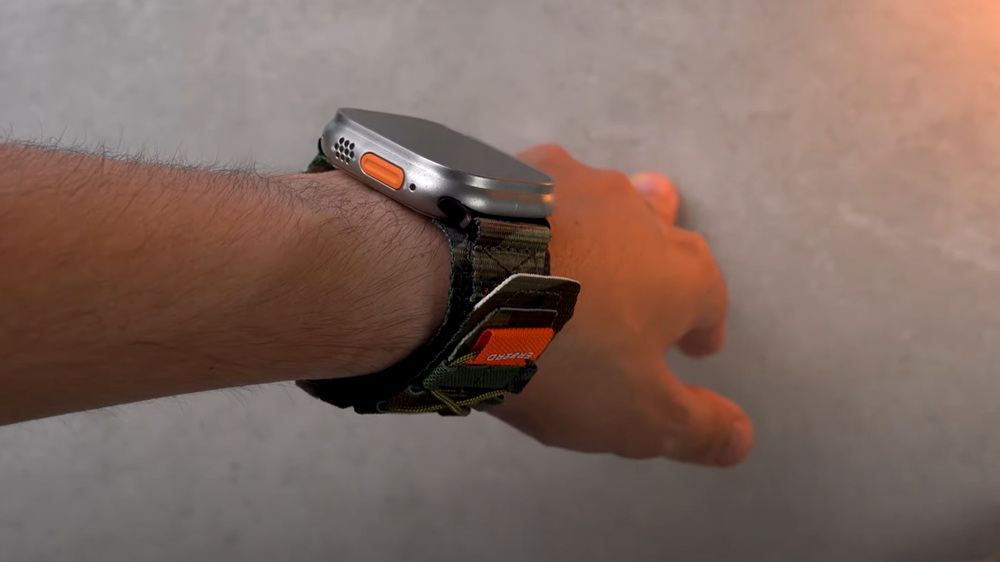 Pomarańczowy akcent na pasku ERBORD Runner